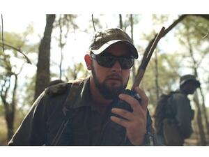 Rangers communicate on mobile devices deep in the bush.