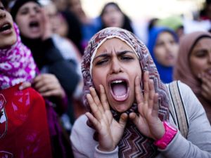 Organized by a coalition of 16 feminist NGOs , hundreds marched in the name of female representation in Egypt's government.