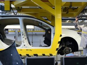 An employee of the French car maker Renault group during the inauguration of a new production plant in Algeria on November 10, 2014. (AFP/File)