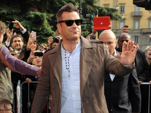 The 'Candy' hitmaker has admitted he's terrified to be left alone because he's likely to "sabotage" his own life but sometimes his battle with mental health actually helps him get up on stage. (Source: ANDREA DELBO - Shutterstock)