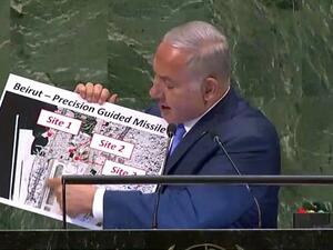 Prime Minister Benjamin Netanyahu showing a diagram of what he said was Hezbollah terror group sites near Beirut. (AFP/File)