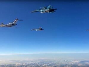 Russian Su-34 bombers and a Tupolev Tu-154 transport plane departed the Hmeimim airbase in Syria, heading back to Russia. (AFP/Russian Defense Ministry)