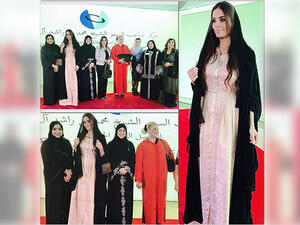 Dominique dressed modestly at the Quran event in the UAE. (Image: Facebook)
