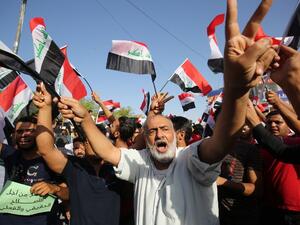 Sadrists rally in Baghdad on July 15 to protest corruption. (AFP/Ahmad al-Rubaye) Sadrists rally in Baghdad on July 15 to protest corruption. (AFP/Ahmad al-Rubaye)