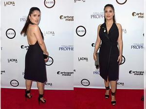 Salma Hayek a vision in tuxedo-style wrap dress at premiere of her animated movie Kahlil Gibran's The Prophet. (AFP)