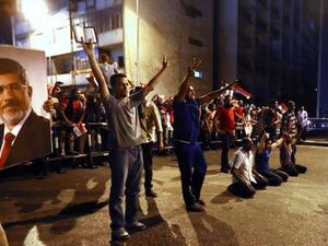 Supporters of the Muslim Brotherhood and Egypt's ousted President Mohamed Morsi block the Six October bridge on July 16, 2013 in the center of Cairo. (Source: AFP/MARWAN NAAMANI)