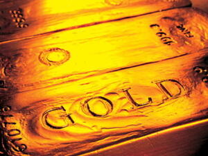 Gold hit a record $1,880 (Dh6,905) an ounce on Friday as European stock markets fell