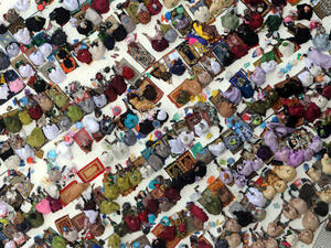 Muslim pilgrims arrive to perform the afternoon prayer in Mecca's Grand Mosque. (Image credit: AFP)