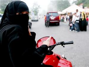 Saudi woman on motorcycle. [telegraph]