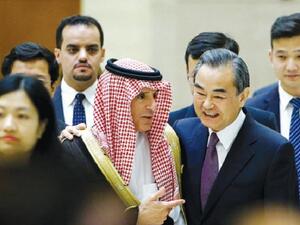 Saudi Foreign Minister Adel Al-Jubeir and Chinese Foreign Minister Wang Yi arrive for a news conference at the China-Arab States Cooperation Forum in Beijing on Tuesday. (AN)