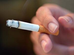 A man has been arrested after appearing in a video apparently forcing a child to smoke. (AFP/ File Photo)