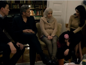 George and Amal with a Syrian refugee mum and her 11-year-old daughter.(Amalalamuddinstyle.files.wordpress.com)