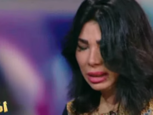 Ghada Ibrahim collapses live on air after desperately trying to defend herself against prostitution allegations. (YouTube)