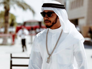 The F1 world champion kept cool by wearing the gown, called as a Thwab, prior to finishing third in the race. (Facebook)