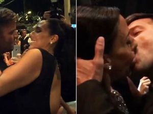 At your service: Female fan pays $90,000 to kiss Ricky Martin on the lips at AIDS charity fundraiser. (YouTube)
