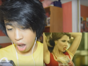 Sammy reacting to Nancy Ajram's music video "Ma Tegi Hena." (YouTube)