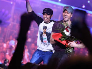 The superstar who wore his signature white tee and baseball cap closed the show with an impressive rendition of "Hero." (Instagram)