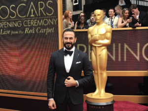 Qusai posing on the Oscars red carpet. (Instagram)