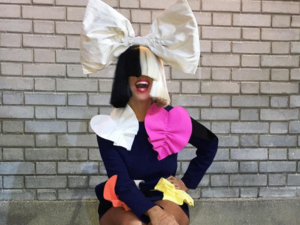 The Australian pop star belted out her hits in the shadow of her dancers. (Facebook)