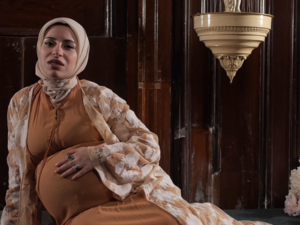 A screenshot from Mona's rap video. (YouTube)