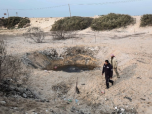 The site of an Israeli air strike targeting a Hamas base in Khan Yunis in the Gaza Strip in December 2017 (AFP/file photo)