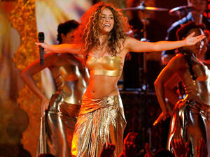 Soon after she seemed to be getting in touch with her Arab side, Shakira, staying in the Middle East, associates herself with
Israel- a move which might upset some 'home' fans.