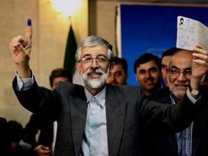 Conservative Iranian lawmaker Gholam Ali Haddad-Adel on Monday withdrew his candidacy from Iran's June 14 presidential election.