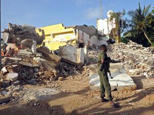 A Somali soldier stands guard on June 26, 2016 on the scene of the attack on a hotel in Mogadishu that killed 15 people the day before and was claimed by al-Shabaab militants. (AFP/Mohamed Abdiwahab) A Somali soldier stands guard on June 26, 2016 on the scene of the attack on a hotel in Mogadishu that killed 15 people the day before and was claimed by al-Shabaab militants. (AFP/Mohamed Abdiwahab)