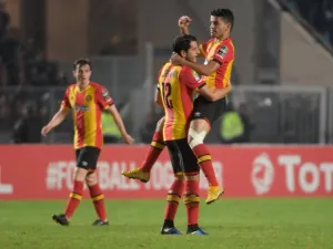 ES Tunis's forward Saad Beguir (up) celebrates after scoring a goal with ES Tunis' defender Khalil Chamam during the CAF Champions League second leg final football match between Egypt's Al-Ahly and Tunisia's ES Tunis at the Olympic stadium in Rades on November 9, 2018.
Fethi Belaid / AFP