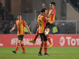 ES Tunis's forward Saad Beguir (up) celebrates after scoring a goal with ES Tunis' defender Khalil Chamam during the CAF Champions League second leg final football match between Egypt's Al-Ahly and Tunisia's ES Tunis at the Olympic stadium in Rades on November 9, 2018.
Fethi Belaid / AFP