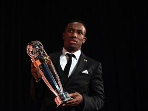 UAE player Ahmad Khalil, winner of the AFC Player of the Year Award poses with the trophy at the Asian Football Confederation (AFC)'s Annual Awards in Gurgaon, on the outskirts of New Delhi on November 29, 2015. AFP PHOTO / SAJJAD HUSSAIN
SAJJAD HUSSAIN / AFP