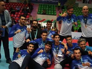 Members of the Iranian men’s Shahrdari Varamin taekwondo club rejoice after claiming the title of the 7th edition of the Asian taekwondo Clubs Championship in Sari, northern Iran, on April 14, 2017. (Photo: Press TV)