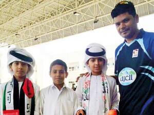 Coach Shahzada Saleem with young Emiratis who are being groomed to play cricket in Al Ain. (Photo: ECB)