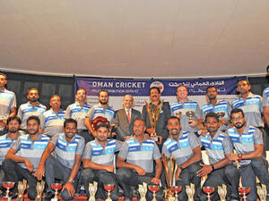 Assarain CT players and officials are all smiles as they display their trophies and awards after winning a domestic double in the 2016-17 season. Assarain won the Premier Division league and T20 titles (Photo: Muscat Daily)