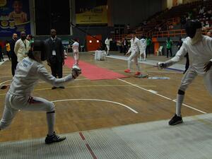 Ramadan Ibrahim of Egypt (left) takes on Nigeria’s Olagunju Zaafir in one of the duels of the Cadet and Junior African Fencing Championship. (PHOTO: NAJEEM RAHEEM)
