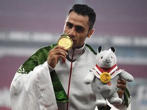 Gold medallist Iran's Hossein Keyhani celebrates during the victory ceremony for the men's 3000m steeplechase athletics event during the 2018 Asian Games in Jakarta on August 27, 2018.
Jewel SAMAD / AFP