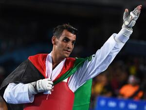 Jordan's Ahmad Abughaush celebrates after winning against Russia's Alexey Denisenko in the men's taekwondo gold medal bout in the -68kg category as part of the Rio 2016 Olympic Games, on August 18, 2016, at the Carioca Arena 3, in Rio de Janeiro.
Kirill KUDRYAVTSEV / AFP