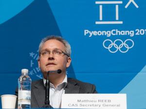 Matthieu Reeb, secretary general of the Court of Arbitration for Sport (CAS), announces the court's decision regarding dozens of Russian athletes banned for doping, in Pyeongchang on February 1, 2018. The Court of Arbitration for Sport on February 1 lifted life bans on 28 of the 43 Russians accused of doping at the 2014 Sochi Winter Olympics.
François-Xavier MARIT / AFP