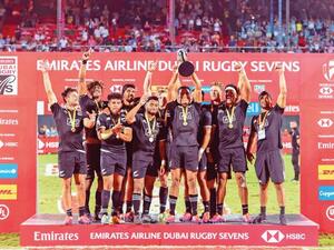 New Zealand team celebrate after clinching the Dubai Rugby Sevens title at The Sevens Stadium in Dubai. (Photo: Antonin Kélian Kallouche/Gulf News)