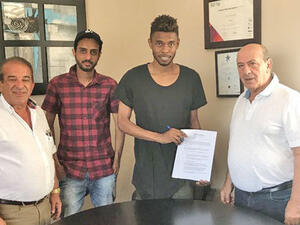 Oman national team midfielder Raed Ibrahim (second from right), his agent Issam al Shanfari (second from left), and Valletta FC officials after the signing of a two-year deal between Raed and Valletta in Malta 