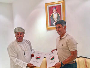 Tahir Zaman (right) and OHA president Talib al Wahaibi after signing the deal on Monday night (Photo: Muscat Daily)