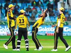 Peshawar Zalmi’s Liam Dawson drives the ball against Islamabad United at the Dubai Cricket Stadium. (Photo: PSL Twitter)