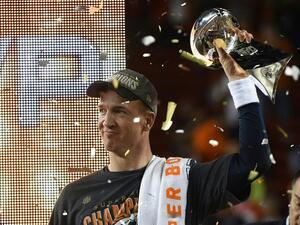 Peyton Manning of the Denver Broncos celebrates with the Vince Lombardi Trophy after Super Bowl 50 at Levi's Stadium in Santa Clara, California February 7, 2016. The Broncos beat the Carolina Panthers 24-10.