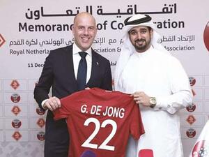 QFA secretary-general Mansoor al-Ansari (right) and KNVB secretary-general Gijs de Jong. (Photo: Gulf Times)