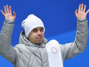 Russia's bronze medallist Semen Elistratov waves on the podium during the medal ceremony for the Men's short track 1500m at the Pyeongchang Medals Plaza during the Pyeongchang 2018 Winter Olympic Games in Pyeongchang on February 11, 2018.
Martin BERNETTI / AFP
