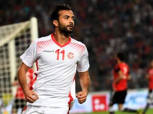 Tunisian striker Taha Yassine Khenissi celebrates after scoring against Egypt during their African Cup of Nations CAN 2019 preliminary stage qualification football match in Rades on June 11, 2017.
FETHI BELAID / AFP
