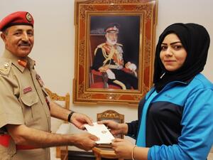 Wadha al Balushi (R) (source: azamn.com)