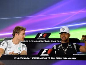 Nico Rosberg (L) takes a 12-point lead over Mercedes team-mate Lewis Hamilton (R) into the season-ending Abu Dhabi Grand Prix which puts him in the driver's seat to clinch his first career Formula One world title.