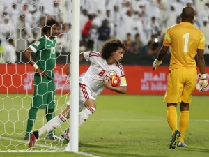 UAE's Omer Abdulrahman celebrates after scoring against Saudi Arabia during their World Cup 2018 Asian qualifying football match on March 29, 2016 at the Mohammed Bin Zayed Stadium in Abu Dhabi.
KARIM SAHIB / AFP