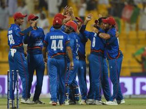 Afghan cricket team celebrates after winning during the one day international (ODI) Asia Cup cricket match between Sri Lanka and Afghanistan at the Sheikh Zayed Stadium in Abu Dhabi on September 17, 2018. Afghanistan won the match by 91 runs.
ISHARA S. KODIKARA / AFP